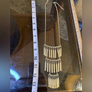 Elegant Gold Necklace with Tiered Pendant Fringe